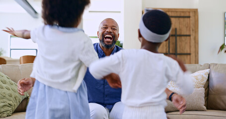 Running, children and father on a sofa with hug, happy and playing in their home together. Kids,...