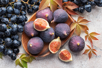 Fresh ripe figs and dark grapes