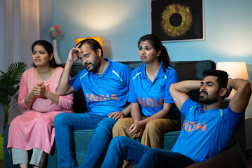 Indian Family with siblings got sad due to loss while watching cricket sports match at home on tv...