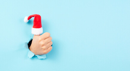Thumb up, Santa Claus hat, Christmas holiday,  positive hand gesture, optimism and emotion, winter...