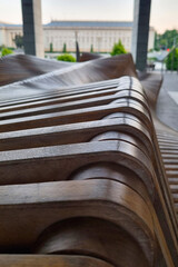 Beautiful wooden bench for people. Outdoor recreation.
