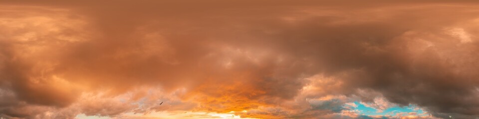 Dramatic sunset sky panorama with bright glowing red pink Cumulus clouds. HDR 360 seamless spherical panorama. Sky dome in 3D, sky replacement for aerial drone panoramas. Weather and climate change.