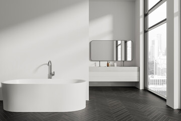 Fototapeta premium White bathroom interior with tub, double sink and blank wall