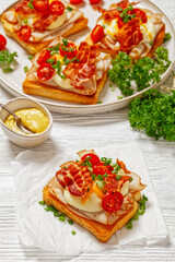 Kentucky Hot Brown open sandwiches on a plate
