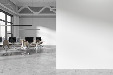 Blank wall in white open space office