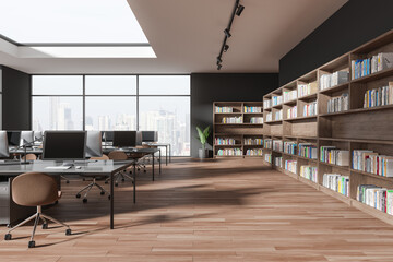 Modern office interior with workspace and chairs in row, panoramic window