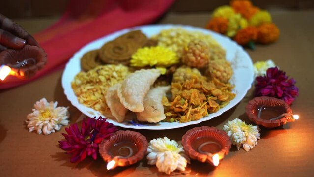 Indian woman decorating  her home for Diwali festival. diwali celebration, auspicious occasion. 
