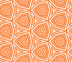 Exotic seamless pattern. Orange symmetrical kaleidoscope background. Textile ready ideal print, swimwear fabric, wallpaper, wrapping. Summer swimwear exotic seamless design.