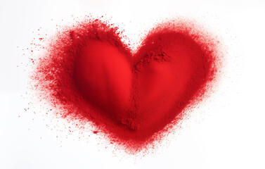 Red powder in the shape of a heart on white background. Valentine's day, wedding, anniversary romantic concept