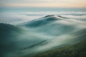 Obraz premium Beautiful natural background of thick white fog in the mountains at sunset