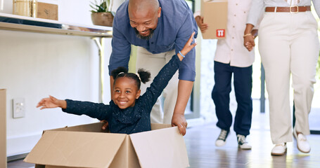 Black family, new home and push in box, smile and together in apartment or house. Girl, father and...