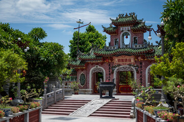 An ancient facade of a religious temple, in south east Asia.  The busilding is located in Hoi An, central Vietnam