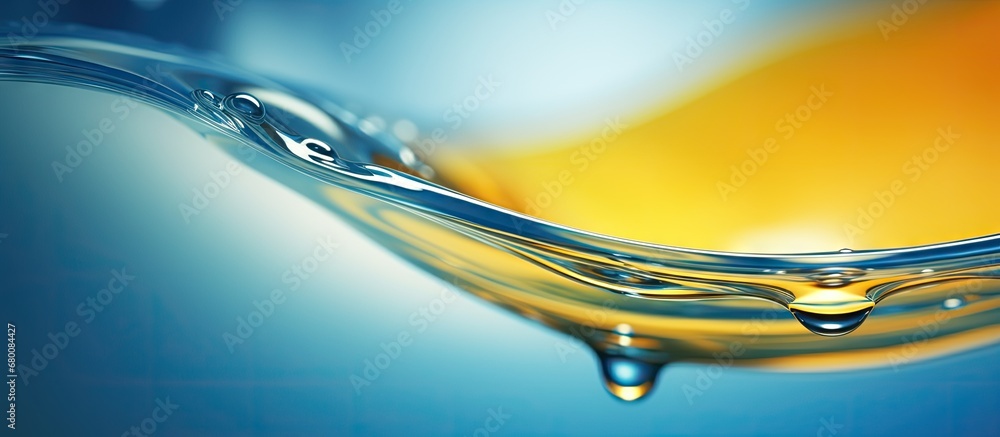 Poster macro creative image showcasing the beauty of the transparent water drop on a smooth surface with bl
