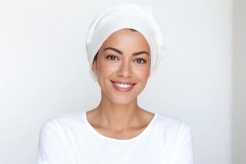 Portrait of a satisfied woman in her 30s wearing a versatile buff against a white background. AI Generation