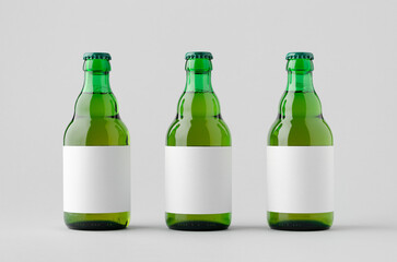 Green steinie beer bottle mockup with blank label.