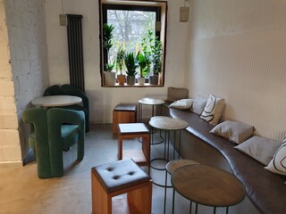 Interior for a coffee shop modern chairs wood table in front of the window.
