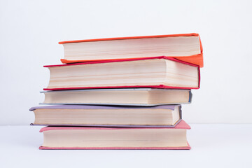 Composition with hardcover books, Books stacking, isolated on white background. Back to school. Copy Space. Education background.
