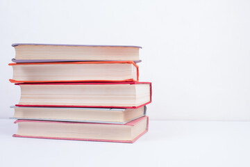 Composition with hardcover books, Books stacking, isolated on white background. Back to school. Copy Space. Education background.