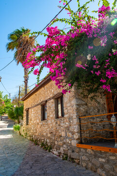 Old Datca Region in Mugla, Turkey. Nostalgic stone houses typical of the Old Datca Region. Datca, Mugla. Beautiful street view with begonville.