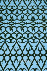Decorative moroccan grid closeup in blue sky