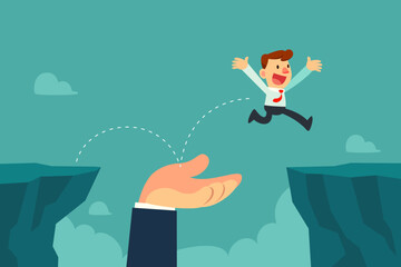 businessman jump on helping hand to cross cliff gap