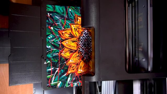 printing color photos abstract drawing of a sunflower in bright colors vision in dreams on an inkjet printer