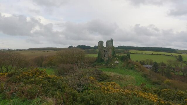 Ruined Irish Castle winter static shot Dunhill CastleWaterford Ireland on a cold winter morning
