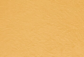 Beautiful orange paper with a three-dimensional structure of crumpled paper
