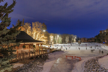 People skating on ice at Bowness Park in Calgary
