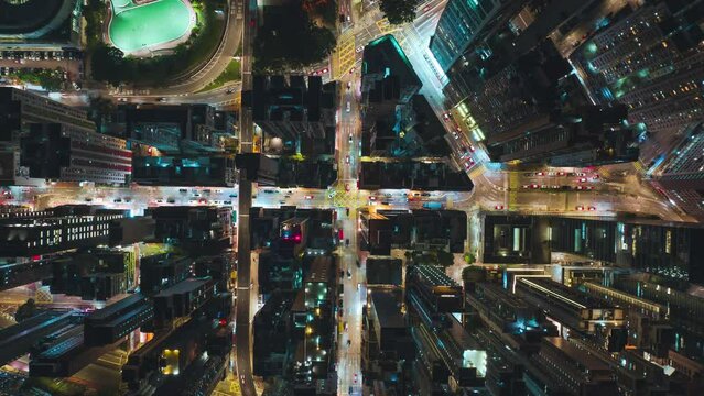 Top View Hyperlapse of Traffic in Hong Kong City, Aerial view city streets at night, Establishing shot for Innovation technology and transportation Concept