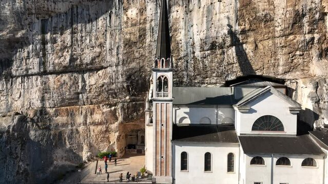 Aerial drone pull back view of Madonna della Corona Church.
Iconic view of the most famous sanctuary in the world.
Madonna della Corona - Spiazzi