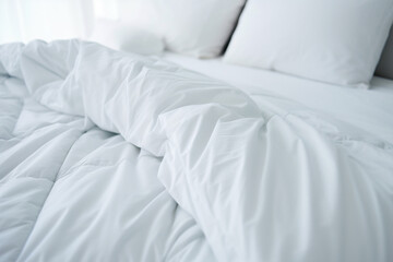 White Folded Duvet Lying on White Bed Background. Preparing for Winter Season, Household, Domestic Activities, Hotel or Home Textile
