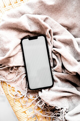 Blank path screen mobile phone with mockup on gray plaid.