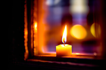A solitary candle burns in a window, a symbol of hope and guidance. Generative AI.