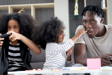 Happy family love bonding, African father and daughter girl with curly hair enjoy spending time...