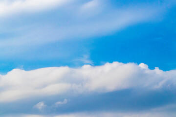 Blue sky with chemical chemtrails cumulus clouds scalar waves sky.