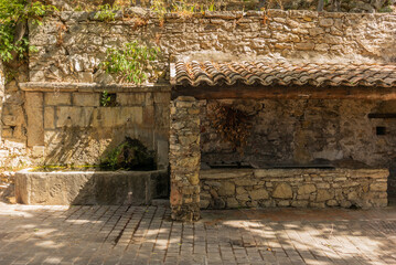 An old fountain in  the village of Le Castellet in south of France