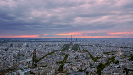 A colorful sunset on Paris before the rain in summer