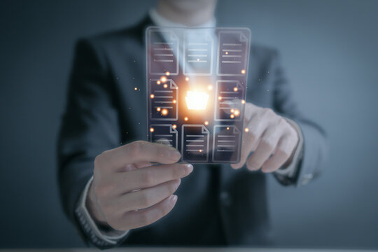 person planning the business plans and analyse  profitability of working companies with digital augmented reality graphics for project manager working on laptop and updating business plan