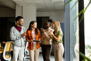 Young multiethnic startup team working in the modern office