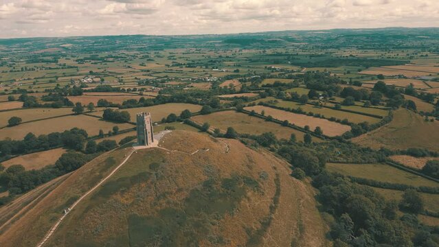 Aerial drone shot of Glastonbury Tor and countryside, Somerset UK