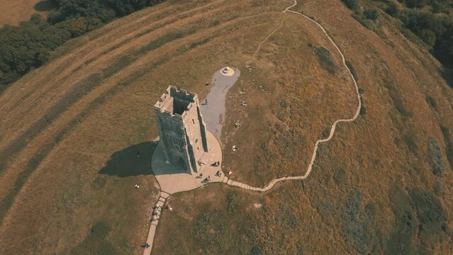 Aerial drone shot of Glastonbury Tor and countryside, Somerset UK
