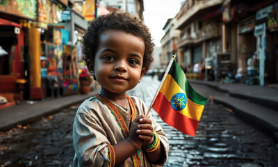 Ethiopian boy holding ethiopia flag in Addis Abeba street
