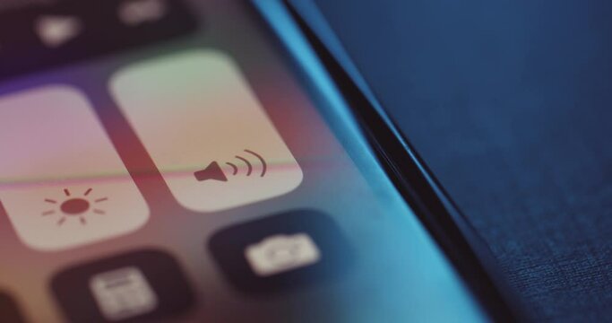 Adjusting volume on device screen - close up