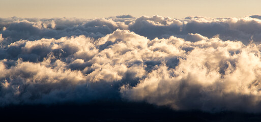 Hawaii dramatic clouds over Mauna Kea volcano