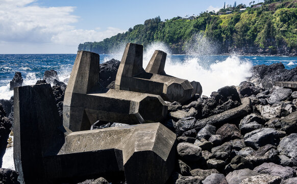 Hawaii huge wave breakers with big splashes over cliffs