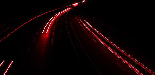 lights of cars driving at night. long exposure