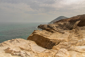 Fototapeta na wymiar Cliff to Beach with Ocean Horizon at Cap Zebib, Bizerte, Tunisia