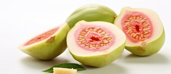 The sweet and ripe guava slice is a delicious example of fresh, natural, and organic food, packed with health benefits and the refreshing taste of natures bounty. - obrazy, fototapety, plakaty