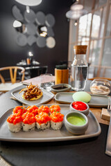Sushi roll with salmon tartare and sesame seeds